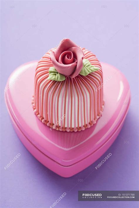 Marzipan covered cake — sweetening, eating - Stock Photo | #151371788