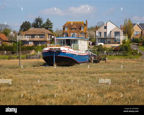 Houseboats On The Shoreline At West Mersea Mersea Island Essex