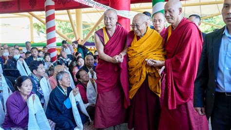 His Holiness The Dalai Lama Engaging With Members Of The Crowd As He