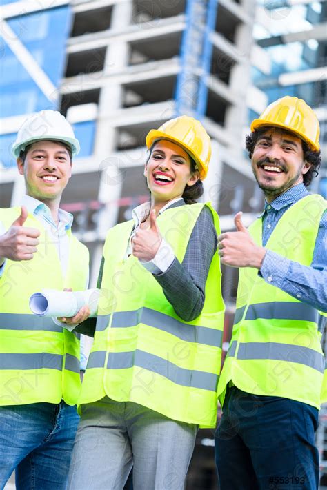 Team Of Civil Engineers And Architects At Construction Stock Photo