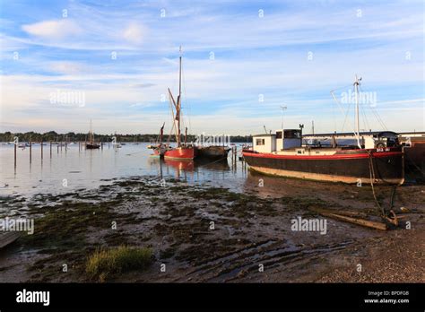 Houseboats And Thames Barge Moored On The River Orwell At Pin Mill