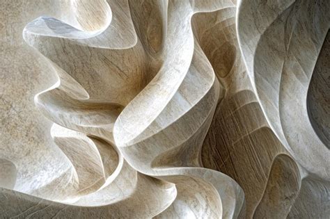premium photo abstract stone sculpture   curved lines