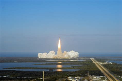 STS-133_lifts_off_from_Launch_Complex_39A_at_Kennedy_Space_Center,_VAB_roof_view | This Day in ...