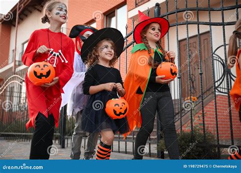 Cute Little Kids Wearing Halloween Costumes Going Trick-or-treating ...