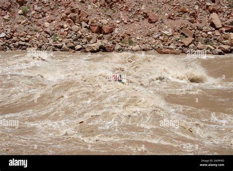 An 18 Rowing Raft Navigates Through The Big Drop Ii Rapid In Cataract