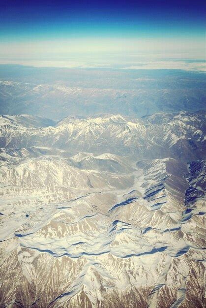 Premium Photo | Aerial view of snow covered landscape