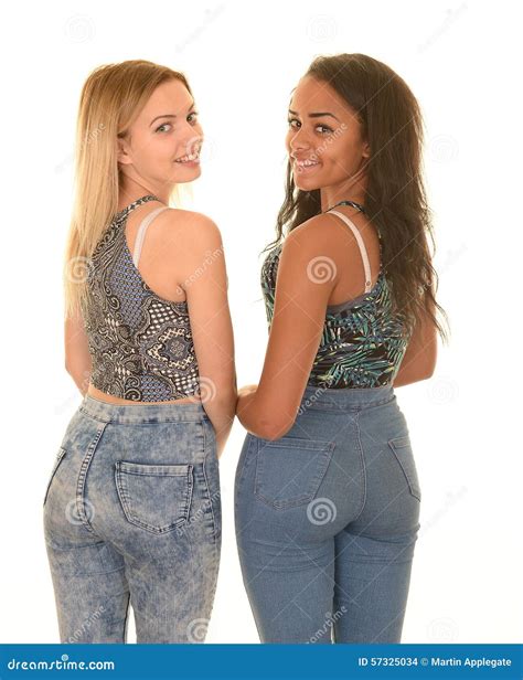 Filles De Ladolescence Posant Dans Des Blues Jean Photo Stock Image Du Mignon Modeler 57325034