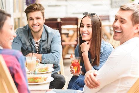 Happy Friends Having Lunch In Cafe — Stock Photo © Iakovenko123 116174390