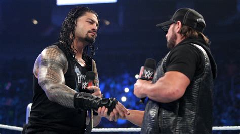 Roman Reigns and AJ Styles size each other up: photos | WWE