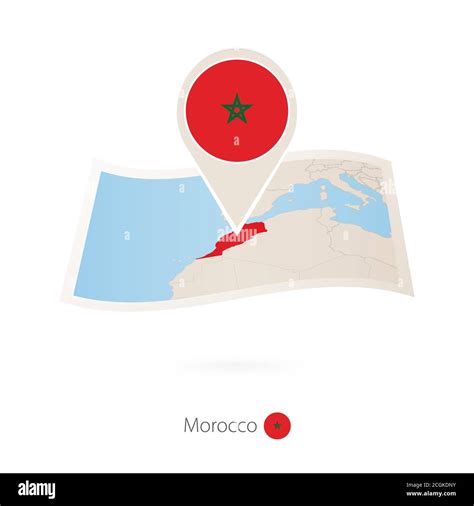 Mapa De Papel Doblado De Marruecos Con El Alfiler De La Bandera De