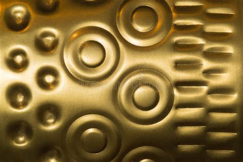 Gold Metal Texture With Golden Circles And Dots Pattern Used As