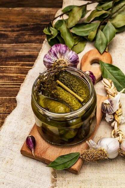 Premium Photo Marinated Pickled Cucumbers With Spices And Herbs