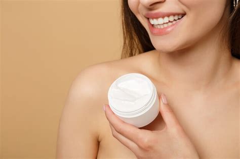 Premium Photo Close Up Half Naked Woman With Perfect Skin Nude Make Up Applying Facial Cream