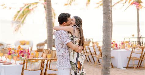 Guests Wore White at a Colorful Beach Rehearsal Dinner