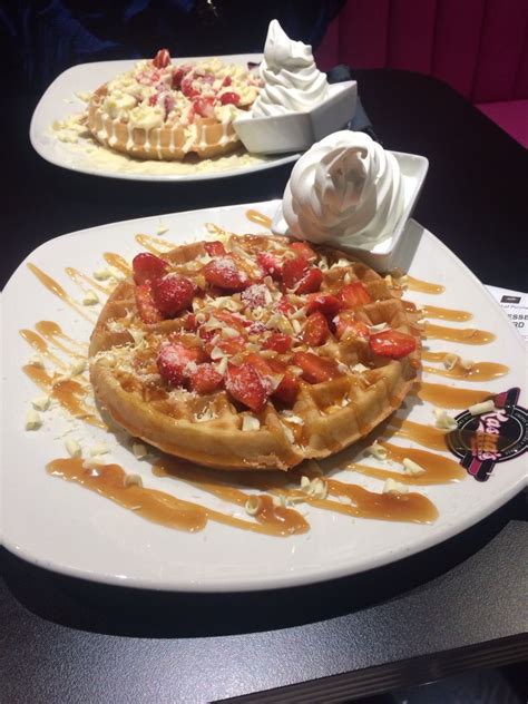 Delicious Waffles With Chocolate And Strawberries