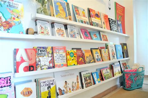 UN MUR DE LIVRES LA BIBLIOTHÈQUE DES ENFANTS Ritalechat