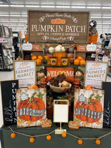 Pumpkin Patch Display At The Grocery Store With Lots Of Signs And