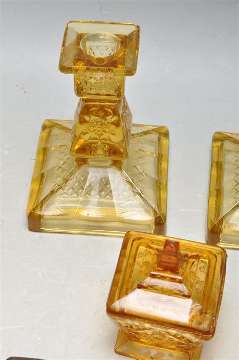 An Early 20th Century Art Deco 1930 S Amber Glass Dressing Table Vanity Set Comprising Of A Mirro