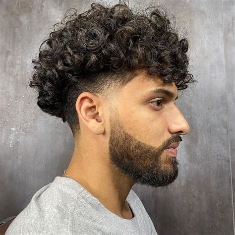 40 Ultra Cool Curly Taper Fade Haircuts for Men in 2025