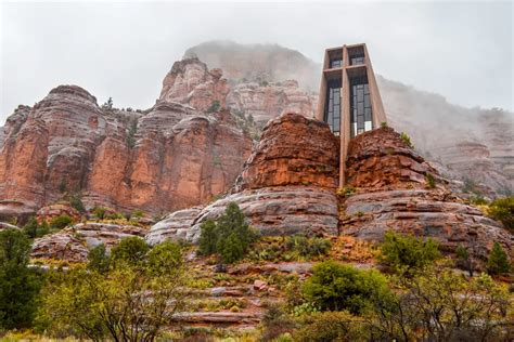 Fog And Steam Surround The Chapel Of The Holy Cross In Sedona Arizona