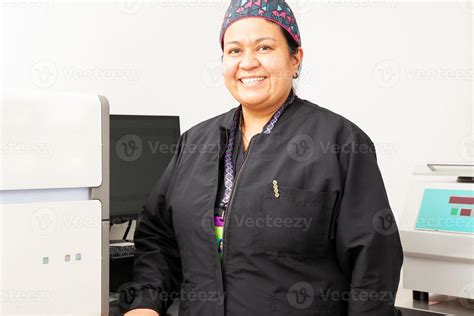 Female Scientist Working At The Laboratory With A Thermal Cycler