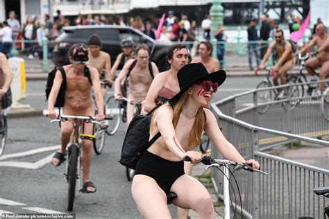 Naked Cyclists Ride Through Toronto In Annual Demonstration Calling For Action On Climate Change