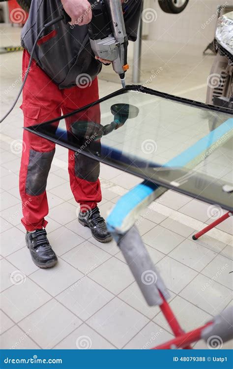 Working To Apply the Adhesive Sealant Stock Photo - Image of petrol ...