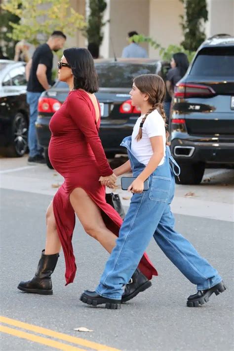Pregnant Kourtney Kardashian Turns Heads in Stunning Red Maternity