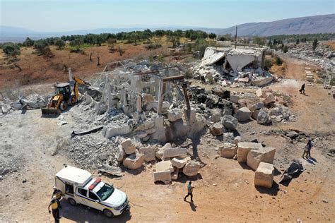 Displaced Syrians in Idlib camps struggle with scorching temperatures ...