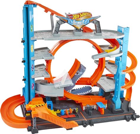 Hot Wheels City Garage Delle Acrobazie Playset Con Pista Collegabile Con Ascensore E Squalo