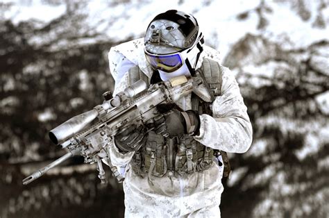 Navy SEAL's demonstrate winter warfare capabilities for a TV commercial produced by the Navy ...