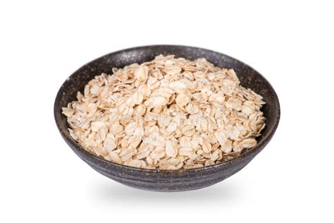 Dry Rolled Oat Flakes Oatmeal In Bowl Stock Photo Image Of Pile