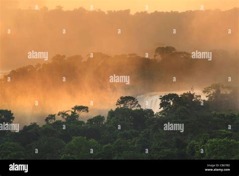 Sunrise over Iguazu Falls, Argentina and Brazil Stock Photo - Alamy