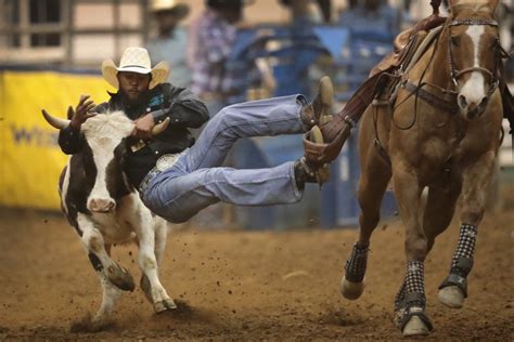 Cowboys And Cowgirls Compete In The Countrys Only Touring Black Rodeo