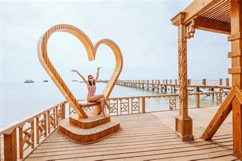 Premium Photo A Girl In A Fashionable Swimsuit Is Sunbathing On The