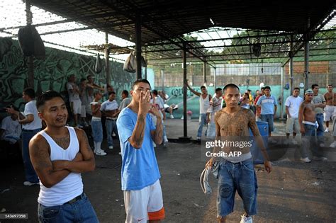 Members of the 18th street gang gather in the yard of the... News Photo ...