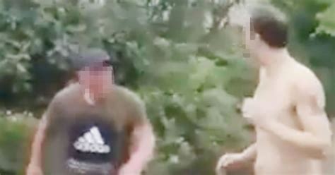 Naked Man Fights Fully Clothed Foe In Street As Bizarre Footage Of