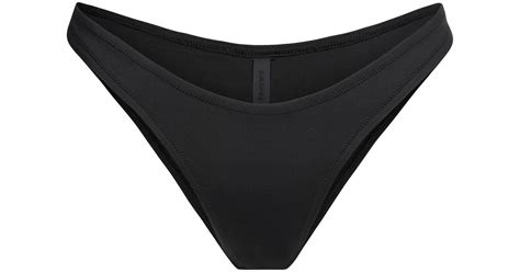 Skims Tanga Bikini Bottom In Black Lyst