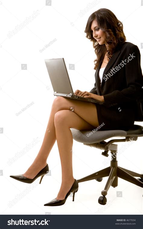 Attractive Brunette Business Woman Sitting On Stock Photo 4677034 | Shutterstock