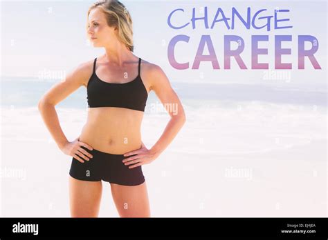 Composite Image Of Fit Blonde Standing On The Beach Stock Photo Alamy