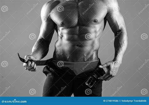 Man Takes Off His Pants Portrait Of A Very Muscular Male Model In Underwear Naked Man Stock