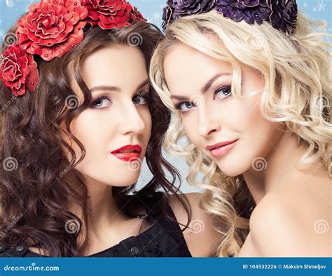 Beauty Portrait Of Couple Of Attractive Blond And Brunette Girls Stock Photo Image Of Concept