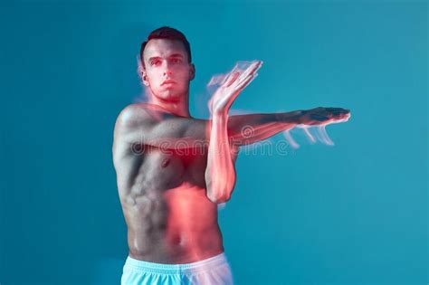 Sportive Male With Naked Muscular Torso Stretching Arms Muscles Sport Workout Warm Up Gym