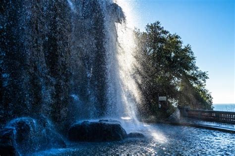 Premium Photo The Scenic Waterfall At Colline Du Chateau Or Castle