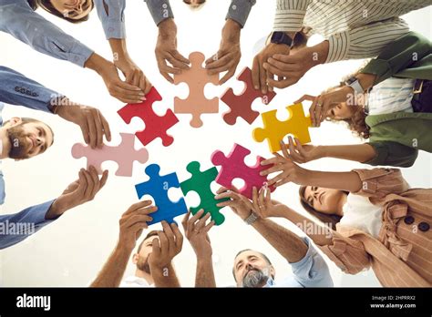 Business People Connecting Puzzle Pieces Hi Res Stock Photography And