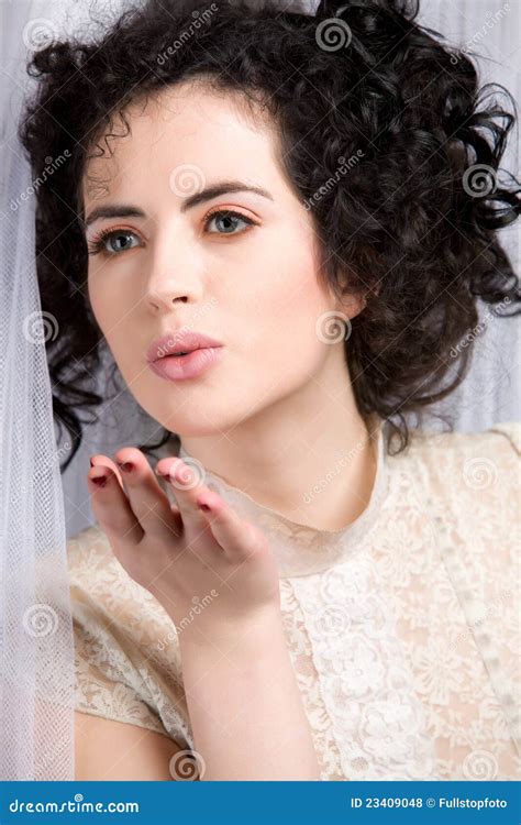 Brunette Model In Lace Blouse Blowing A Kiss Stock Photo Image Of Facial Mysterious