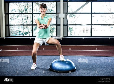 Fit woman doing exercise with bosu ball Stock Photo - Alamy 