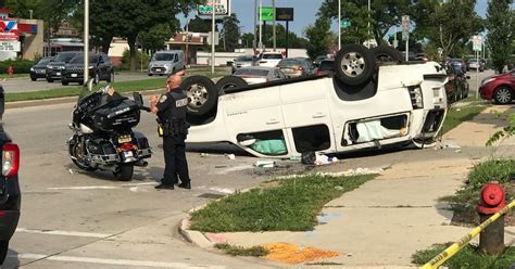 Woman injured after crash causes car to flip over near 72nd and Capitol