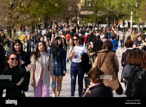 Crowd of people walking in the city park in downtown Sofia, Bulgaria ...