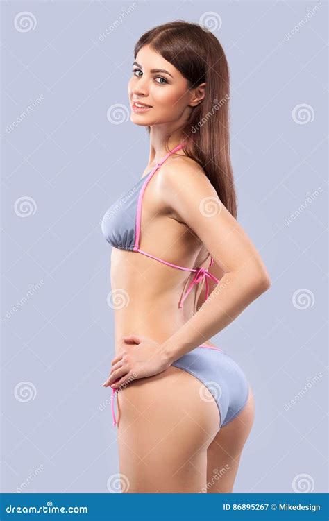 Blonde Woman Wearing Swimwear Posing On Color Background Perfect Body